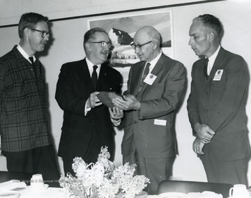 Left to right, Dr. Edward V. McMichael; Dr. Paul Price, W. Va. State Geologist, Professor of Geology; Delf Norona, and Charles P. Kelly.