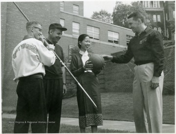 Left to right, Red Brown; Bill Bonsall, unidentified student, Fred Shaus.