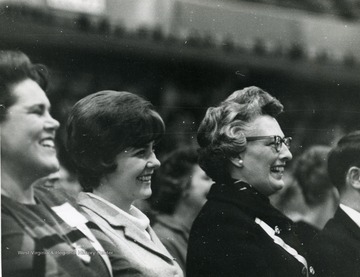 Betty Boyd (left), Associate Dean of Student Educational Services; unknown; Mary Jane Schuster (right) Assistant Dean of Women.