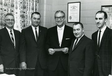 Center, Dean Ray O. Duncan; At left, Pete Yost. 