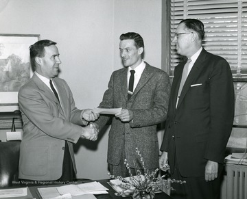 Left, Joseph Gluck; Center, Unknown; Right, Dean, C. A. Arents, College of Engineering.