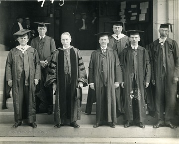 Rear row, Dr. P.B. Reynolds, Professor A.J. Hare; Front row, Robert A. Armstrong, President D.B. Purinton, Professor A.R. Whitehill, Professor W.H. Boughton, Dean T.C. Atkeson.