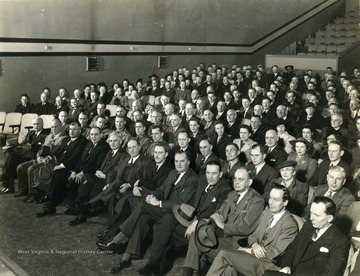 'First row, fifth from right, Chas Neff, University Vice-President; First row seventh from right, Robert Pritchard, Weston Democrat; Third row seventh from right, Edwin Jones. E.E. Department; Third row eleventh from right, Cecil Highland, Clarksburg Publishing Company; Front row ninth from right, P.J. Reed, Dean of WVU Journalism School.  Identified by Leonard Davis, School of Speech Communications, 11/1995.'