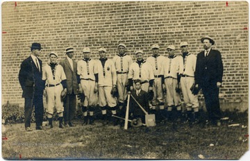 Baseball team from Matoaka, W.Va., with Charles Wheeler on the far right and Peach Trail behind the mascot.  The pitcher was Clay Ratliff.