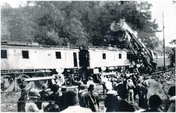 Train collision occurred six miles east of Princeton, Mercer County, at about noon on May 24, 1927.  'Two trainmen were killed and about twenty people were injured.  The accident occurred fourteen cars west of the first tunnel at Ingleside when Virginian Railway (now Norfolk Southern) westbound passenger train No. 3, the steam locomotive, met head-on with one of the huge eastbound electric motors hauling about 100 loaded coal cars downgrade, pushing No. 3 back down the grade a distance of 270 feet.  The passenger locomotive climbed on top of the electric motor.  The Virginian had been electrified from Mullens, W.Va. to Roanoke, Va. in 1925-1926.'