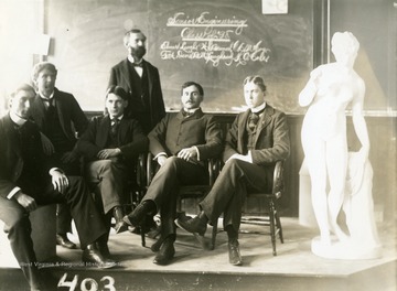 Left to right, Harry O. Cole, Fred Davis, Berton M. Laughead, Elmer Leach, Wm. J. Bruner, Charles  E. McCoy. Senior engineering class of 1898. Leach, a consulting engineer; C.E. McCoy, now in Insurance business in Charleston, W. Va; Bruner, who is with the Highland Contracting Co. in Pittsburgh; Fred Davis, head of the . W. Va. Good-roads testing department; Laughead, who is now with the Pennsylvania Railroad Co. at Washington, Pa; and Harry Cole who is president of the Cole Brothers Construction Co. of Morgantown.