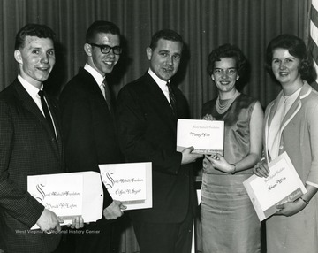 Left to right, Donald A. Layton, Clifford N. Sypolt, Unknown, Nancy Fint, Sharon White.