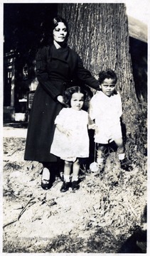 'Mrs. F. Chas. Carter and two children; 314 West Terrace Street, Syracuse, N. Y.  Chas. graduated in 1916.'  Mr. Chas. Carter was a student at Storer College for African-Americans.