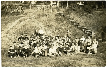 'A class of 1919 before Annual brush with Sophs [Sept. 1915]; Sophs defeated on High Street in Front of Sigma Nu House so Frosh wore no freshman caps.'