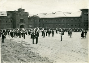 ROTC Band playing as companies march on the old athletic field.