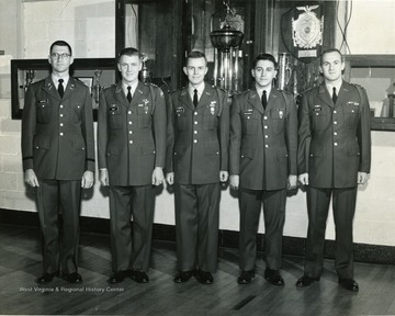 Standing from left to right: Captain Wayne E. Shaffer, Advisor; Captain Richard Haley; 1st Lt. Robert Brown; 2nd Lt. Marion Massiople; 1st Sergeant Joel Gaydos.  