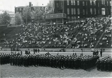 WVU R.O.T.C. drill with sponsors in Old Mountaineer Field (where current B&amp;E building stands).