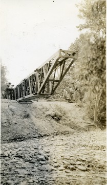 Cadets push a section of a bridge.