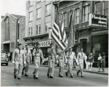 Members of VFW parade on High Street.