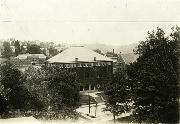 Looking down onto Commencement Hall. Part of Stewart Hall is visible and the Armory building is in the background.