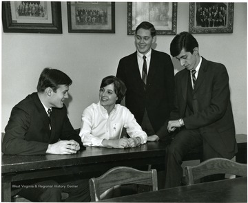 Far left is Terry Nelson, third from left is John Nutter, and on the right is Glen Comuntzis