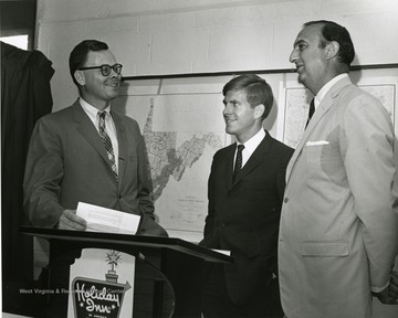 'Planning committee chairman Robert Dyck (left) chats with speakers David Hardesty (center) and Julius Singleton (right) at the June 28-29, 1967 'Man and His Community' symposium.'
