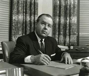 President Harlow at his desk.