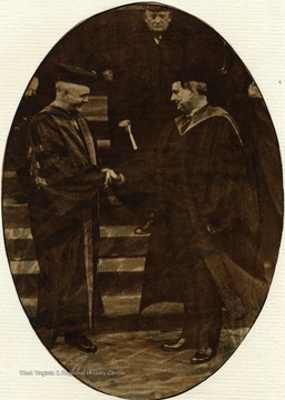 'Governor Howard M. Gore, right, chief executive of West Virginia greeting Dr. John Roscoe Turner, at the inauguration exercises when Dr. Turner became president of West Virginia University.'
