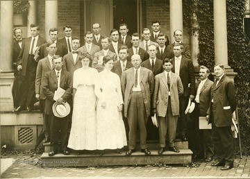 'W.E. Rumsey, third row, third from left.'