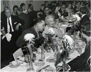 'WVU's 100th Anniversary Birthday Dinner.  In center is Marine Corps Brig. Gen. Earl E. Anderson, WVU alumnus, who appeared earlier in the day on the Alumni Headliner Series, speaking to WVU students.'