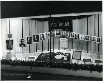 Photos of WVU Presidents are included in the display.