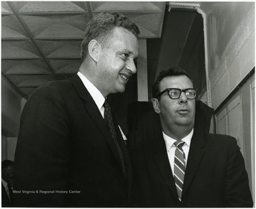 'Banquet speaker Andres Bullis, U.S. Department of Health, Education, and Welfare, speaks with master of ceremonies, State governmental aide Dick Slavin at the "Man and His Community" symposium on June 28-29, 1967.' 