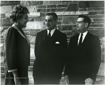 'Mrs. Gilbert Bachmann, member of the WVU Board of Governors (left), chats with WVU professor John Caruso (center) and Dr. Lewis Hanke, Columbia University historian prior to Hanke's address at the Feb. 23, 1967 panel session of the Lessons of History symposium.'