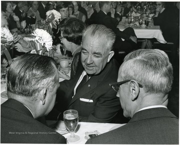 'From left ro tight: unidentified, former WVU governor Okey Patterson, And former WVU President Irvin Stewart.'