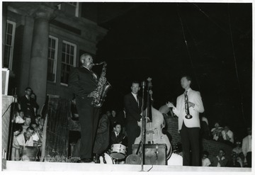 An evening with a jazz band is held at Memorial Plaza in front of Oglebay Hall.