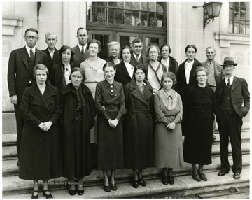 Front Row, left to right: Virginia Madigan; Jennie Boughner, Librarian; Mrs. Mildred Arnett Reed; Margaret Reay; Ruth Blodgett; Barbara Bierer; Dr. Lonnie Arnett, Head Librarian. Second Row, left to right: Professor Fetus Summers; Ms. Florence Reese; Byrd Pickens; Mrs. Mary Lou Richardson Hann; Evelyn Hite; Georgia Wade. Back Row, left to right:  Mr. John Bayles, Head Custodian; Carroll Reynolds; Mrs. Eleanor Knutti; Andy Wiley; Jess Madigan; Mr. Lindsay Johnson, Custodian. 