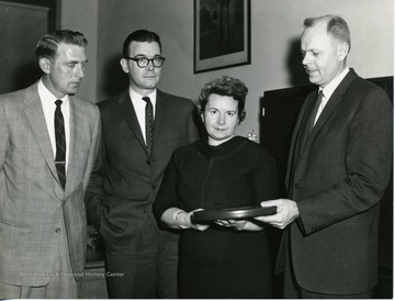 2nd from left: R.F. Munn, Librarian; 3rd from left: Mildred Brain, AVA.