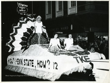 A float in homecoming parade by TKE with a reference for an upcoming football game with Penn State.