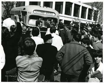 'Students protesting against Vietnam War, R.O.T.C. on campus, and Kent State killings.  3000 students stopped bus, temporarily occupied administration building and ROTC headquarters in Woodburn Hall.'