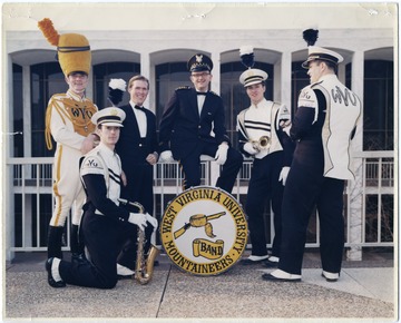 Members of the WVU marching band pose in front of Mountainlair.