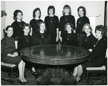 Last row, center is Jennifer Brand. Seated, from right, Carolyn Jacobs and Martha Harris.