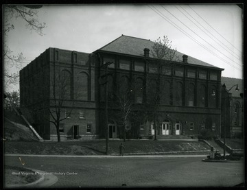 Information on the back of the photograph: 'Reynolds Hall before completion from Commencement Hall.' After remodeling Commencement Hall, the building was rededicated as Reynolds Hall for Powell Benton Reynolds, professor, chaplain, vice president and twice acting president of the University.