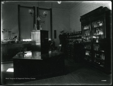 John A. Myers (Director) at Chemistry lab at Agricultural Experiment Station.