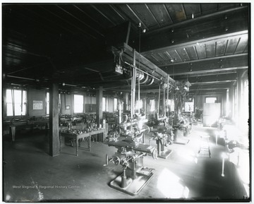 A workshop in the Mechanical Hall shows rows of machinery in the room.