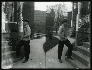A male student at Agricultural Experiment Station steps.
