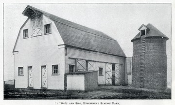 A view of barn and silo at Experimental Station Farm.