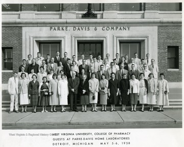 Group portrait of pharmacy students.  Lester Hayden, seventh from left, first row, and Mrs. Hayden.