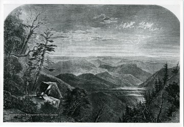 Showing two men in the lower left corner on a bedrock admiring mountain view.