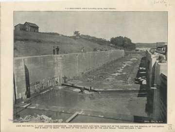 'U.S. Improvement, Great Kanawha River, West Virginia. Lock and Dam No. 7 - Lock looking downstream. The derricks have just been taken out of the chamber and the removal of the cofferdamn is about to begin. The most of the coping is set on the lock walls. Taken October 1, 1891.'