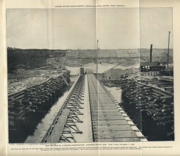 'U.S. Improvement, Great Kanawha River, West Virginia. Chanoine Wicket Dam. Showing the weir part of the dam (from center pier looking toward abutment) after the wickets and service bridge had been placed inside the cofferdam. The wicket and trestle chains and part of the aprons for the bridge were yet to be placed. (See views taken same day, showing the wickets and service bridge standing.)'