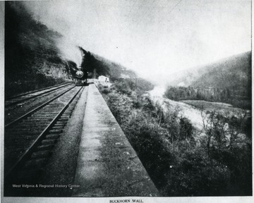 'This stupendous bit of masonry was one of the greatest achievements of early railroading.  It was built as a retaining wall for the bed of the Baltimore and Ohio Railroad, by Benjamin H. Latrobe, along the Cheat River, near Rowlesburg, W. Va., enabling the railway to cling safely to the side of the mountain.' 