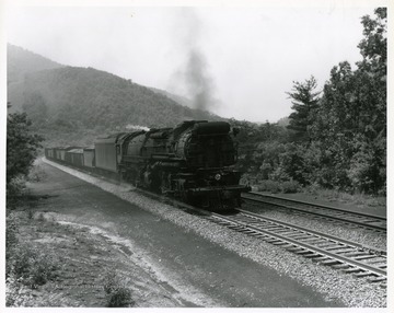Image from the collection of the Chesapeake and Ohio Historical Society. 'CSPR-264; C.&amp; O. H-7, 2-8-8-2 Simple Articulated #1577 on coal train climbing Allegheny grade near White Sulphur Springs, W. Va. June 1943.'