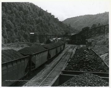 Image from the collection of the Chesapeake and Ohio Historical Society. 'CSPR-315: Two C.&amp; O. H-6, 2-6-6-2 Mallets switching coal cars at Stanaford, W. Va. tipple.'