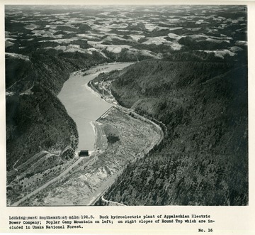 'Looking east southeast at mile 192.5.  Buck hydroelectric plant of Appalachian Electric Power Company; Poplar Camp Mountain on left; on right slopes of Round Top which are included in Unaka National Forest.'