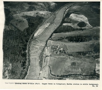 'Looking south at mile 176.7.  Capper ferry in foreground; Bertha station in middle background.'